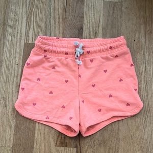 Heart shaped polka dot. Jersey shorts. Draw string. Orange